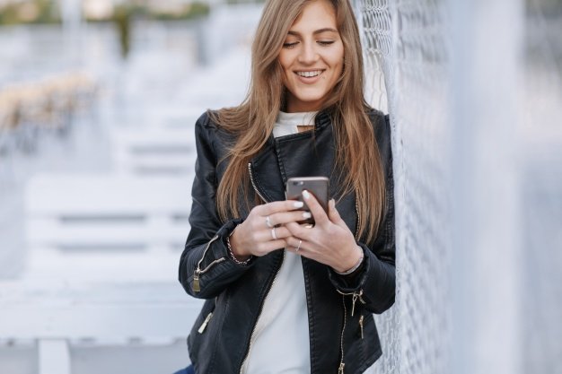 Woman Looking at Her Smartphone